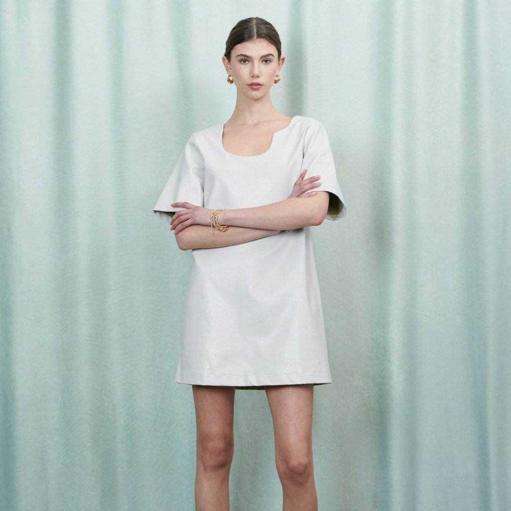 Faux leather t-shirt dress with asymmetric neckline